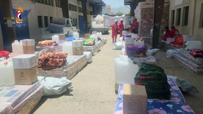 Distribución de ayuda a familias desplazadas y afectadas en el distrito de Ma'in, Sana'a